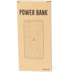A kraft cardboard box containing a speckled power bank. The box features a branding logo and is labelled "Power Bank."