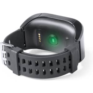 A black smartwatch with a green indicator on the back and a flexible strap, featuring a logo.