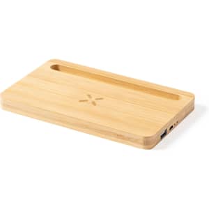 A bamboo wireless charger with a sleek design and a slot for organising phone accessories, featuring a logo.