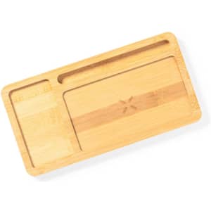 A bamboo organiser charger with two slots for holding devices, featuring a natural wood finish and a minimalist design.