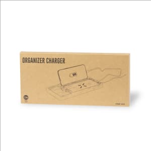 A brown cardboard box containing the Golbar Organizer Charger with a wireless charging pad and compartments for organisation.