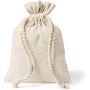 A drawstring bag in a light beige colour with a textured fabric and knotted closure. It features a simple logo.