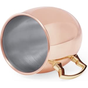 A coffee mug with a polished rose gold exterior and a sleek stainless steel interior, featuring a stylish handle.