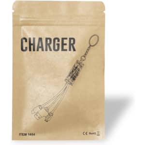 A charging cable packaged in a brown paper pouch with an illustration and a keyring attachment.