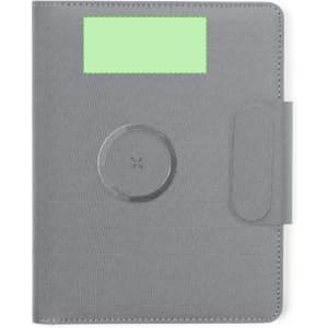 A grey multifunction notepad with a circular design element and fastening strap, featuring a space for branding or labels.