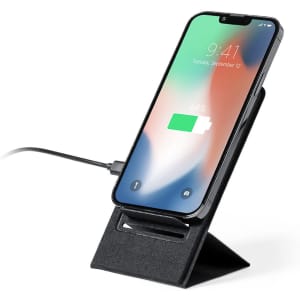 A wireless charger in black, featuring a phone mounted upright and connected with a charging cable.