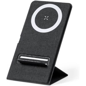 A black wireless charger with a fabric texture and a circular charging area, designed to stand upright.
