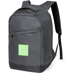 A grey anti-theft backpack with padded straps and a logo. It features a front zip pocket and a square patch.