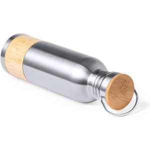 A drink bottle in a sleek stainless steel design with a bamboo accent and a metal ring for easy carrying.