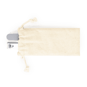 A cream-coloured pouch containing a nail clipper and a nail file. The pouch has a drawstring closure.