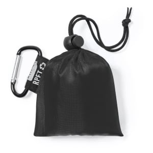 A black compact poncho in a drawstring pouch with a carabiner attached. The pouch features a logo label.