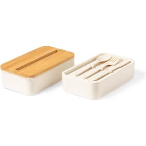 A white lunch box with a bamboo lid, featuring compartments for utensils. It includes a fork, knife, and spoon.