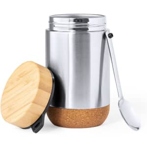 A stainless steel container with a cork base and wooden lid, accompanied by a metal spoon.