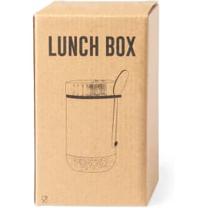 A brown cardboard box containing a lunch box, featuring a spoon and a simple design. The box has a logo.
