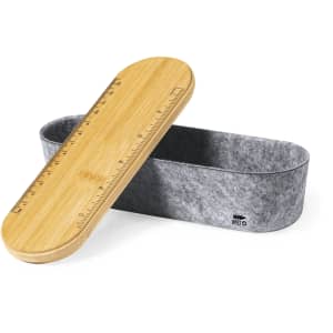 A grey felt pencil case with a bamboo lid featuring a ruler. The case is oval-shaped and has a logo.