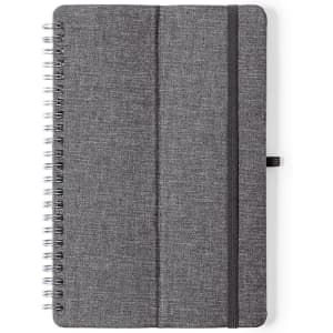 A grey spiral-bound notebook with a textured cover, featuring an elastic band and a bookmark.