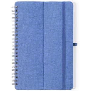 A blue spiral-bound notebook with a fabric-like cover and an elastic band closure. It features a logo on the front.