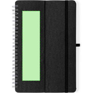 A black spiral-bound notebook with a textured cover, featuring a blank green area and an elastic band.