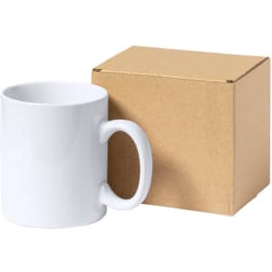 A white mug placed next to a plain brown cardboard gift box. The box has a simple design and no visible branding.
