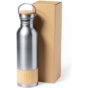 A stainless steel drink bottle with a bamboo base and a wooden lid, presented in a brown cardboard box.