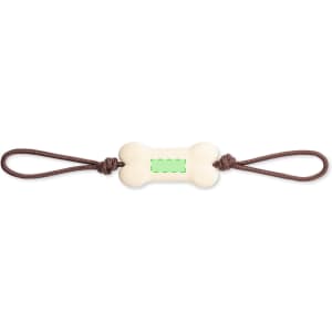 A bone-shaped dog chew toy in white with a green centre, featuring brown handles on each end.