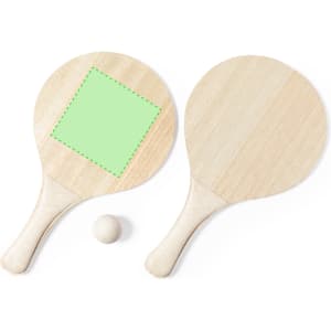 Two wooden beach rackets in natural colour with a small white ball, featuring a green square area on one racket.