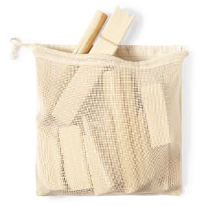 A mesh bag filled with wooden blocks and sticks in a natural colour. The bag has a drawstring closure.