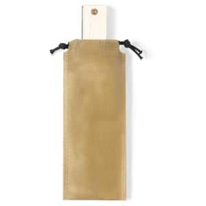 A blues harmonica in a gold carrying case with a drawstring closure. The harmonica has a wooden body and metal ends.