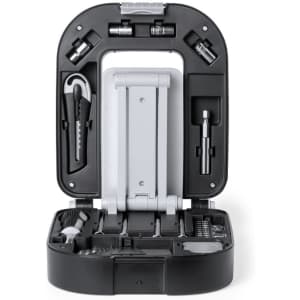 A compact black and grey tool set in an organised case, featuring various tools and a logo.