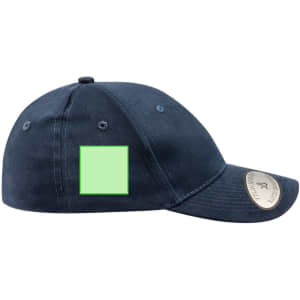A navy cap with a green blank patch on the side and a branded emblem on the front.