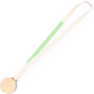 A wooden medal with a round pendant and a cream ribbon featuring a green stitched edge.