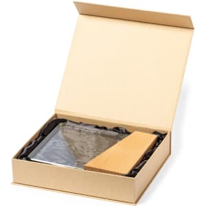 A rectangular glass plaque with a wooden base, presented in a box lined with black fabric.