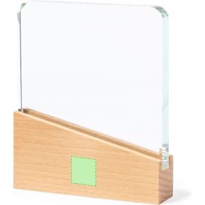 A clear rectangular award plaque with a wooden base, featuring a simple green logo area.