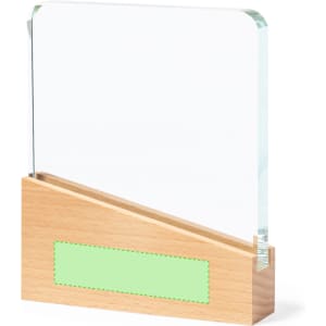 A clear glass plaque with a wooden base, featuring an empty green label for customisation.