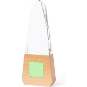 A glass trophy with a wooden base, featuring a clear, angular design and a green section on the front.