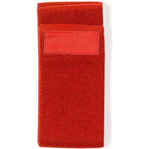 A red exercise band with a textured surface and a small fastening area, featuring a logo.