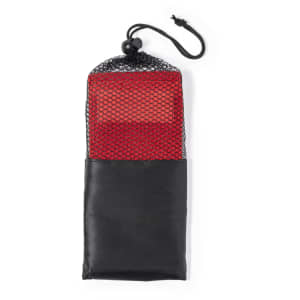 A red exercise band enclosed in a black and mesh storage pouch, featuring a drawstring closure.