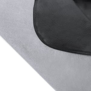 A grey picnic blanket with a black border and textured surface, featuring a logo in one corner.