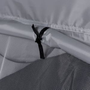 A close-up view of the grey Rebrax Tent fabric featuring a black tie and mesh detailing.