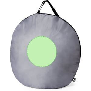 A round, grey outdoor cushion with a green circular centre and a handle for easy carrying.