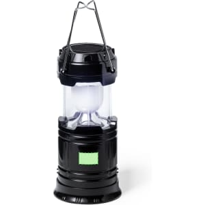 A black power bank lamp with a transparent body and a hanging handle, featuring a green logo on its base.