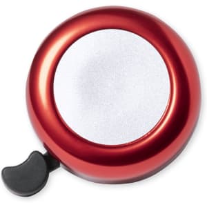 A red bike bell with a shiny silver centre and a black lever.