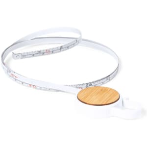 A white tape measure with a bamboo casing, featuring a flexible measuring tape marked in metric units.