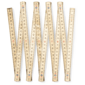 A set of wooden rulers arranged in a zigzag pattern, featuring measurement markings in both centimetres and inches.