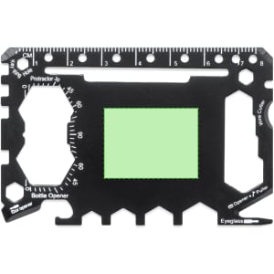 A black multitool card with various functions, including a protractor, bottle opener, and ruler.