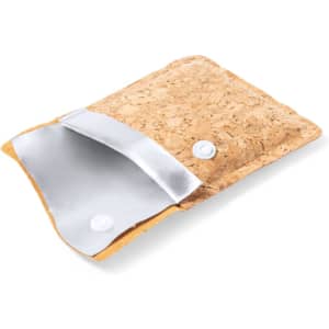 A cork pocket ashtray with a silver interior, featuring a button closure. Ideal for outdoor use.
