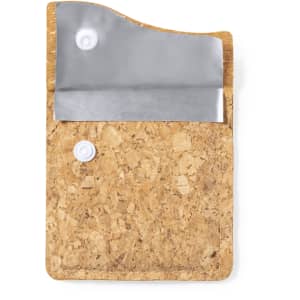 A cork pocket ashtray with a silver metal lid and two snap closures, ideal for outdoor use.