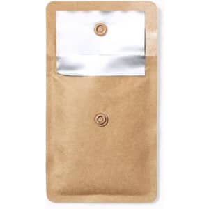A brown pocket ashtray with a silver interior and snap button closure. It features a logo on the exterior.