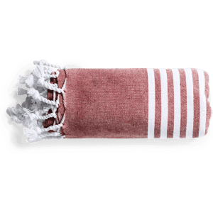A rolled Vedant Towel Pareo in a reddish hue with white stripes and tassels on one end. It features a logo.
