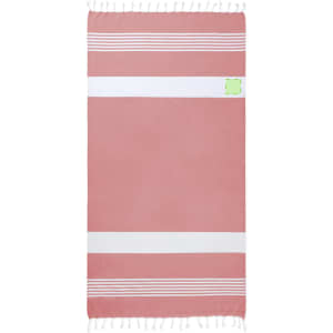 A pink and white towel pareo featuring a striped design and decorative fringes, with a logo in one corner.